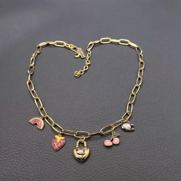 COACH Gold Charm Necklace with Heart and Cherry Accents - Picture 2 of 9